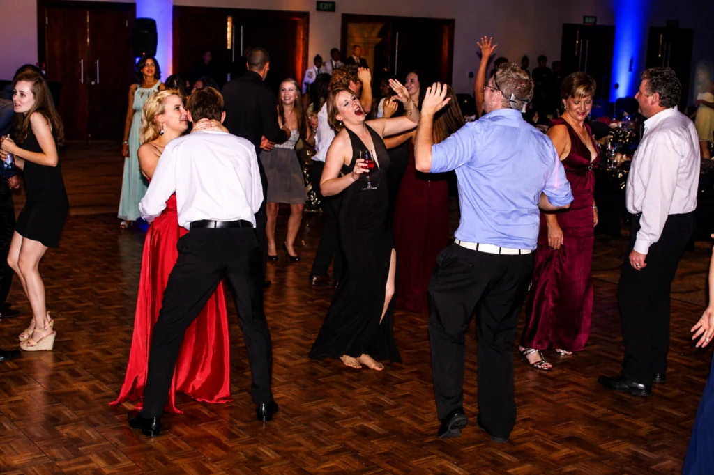 Guests enjoying a corporate Christmas party